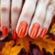 autumn inspired warm orange nails